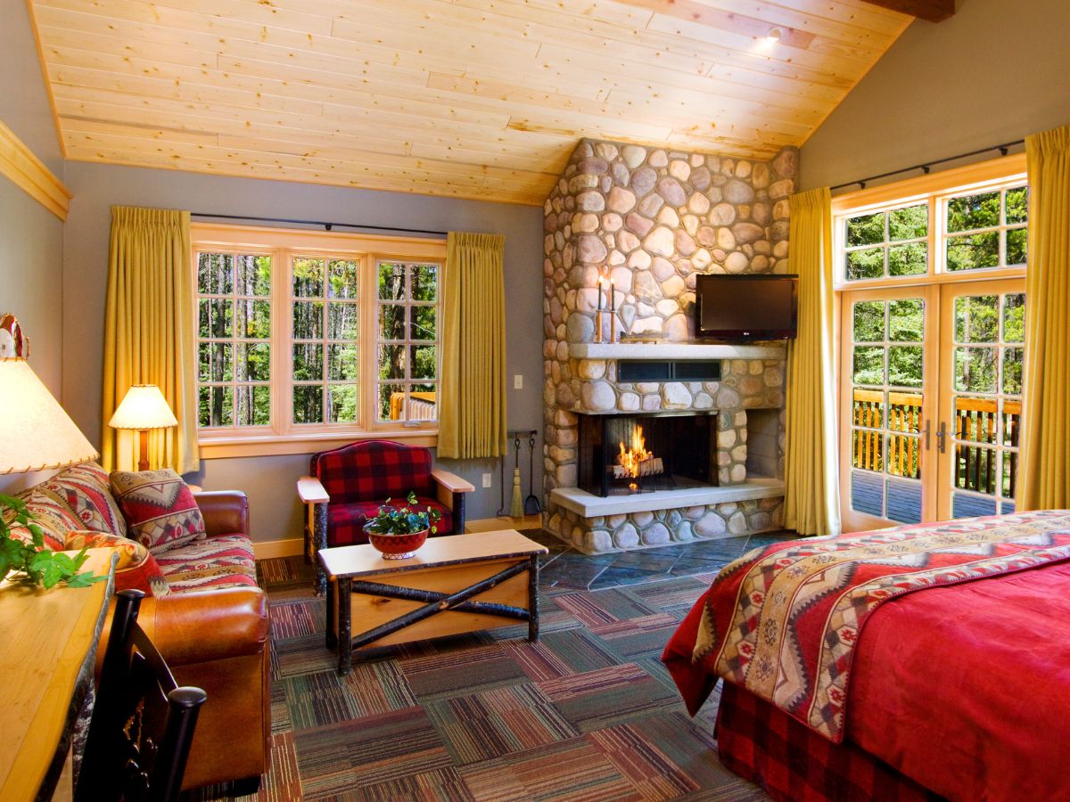 Interior of deluxe bedroom suite at alpine village jasper
