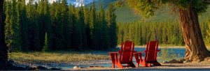 Adirondack chairs in a peaceful setting at alpine village